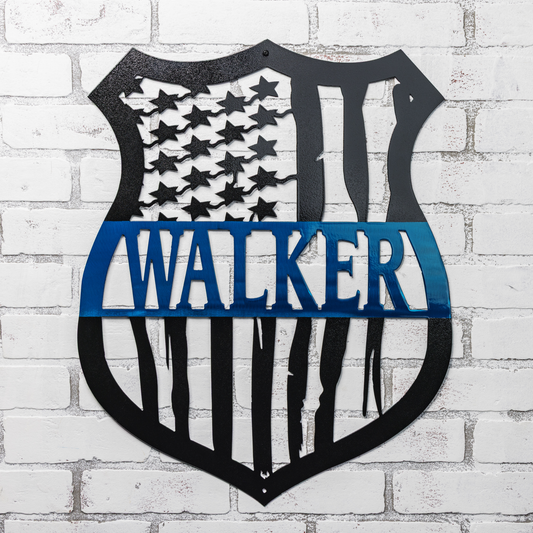 Personalized monogram badge sign with American flag cutout and thin blue line decor for police officers.