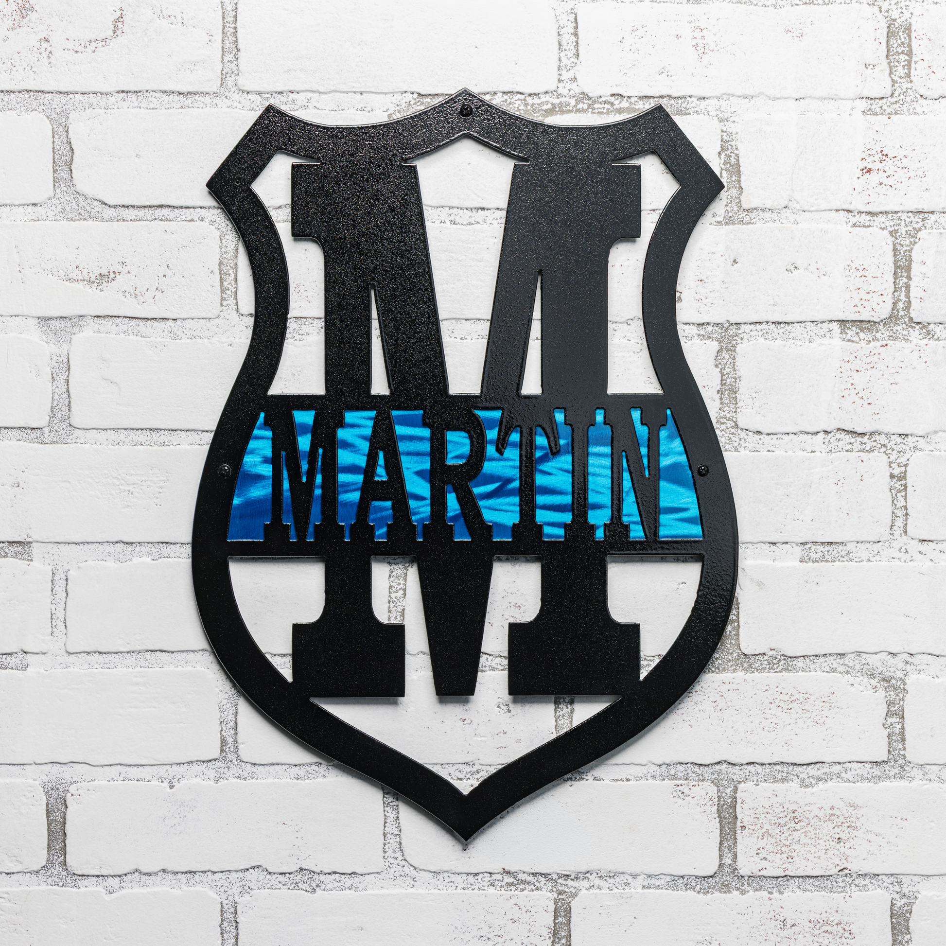 Personalized thin blue line monogram badge sign made from steel with custom police decor styling