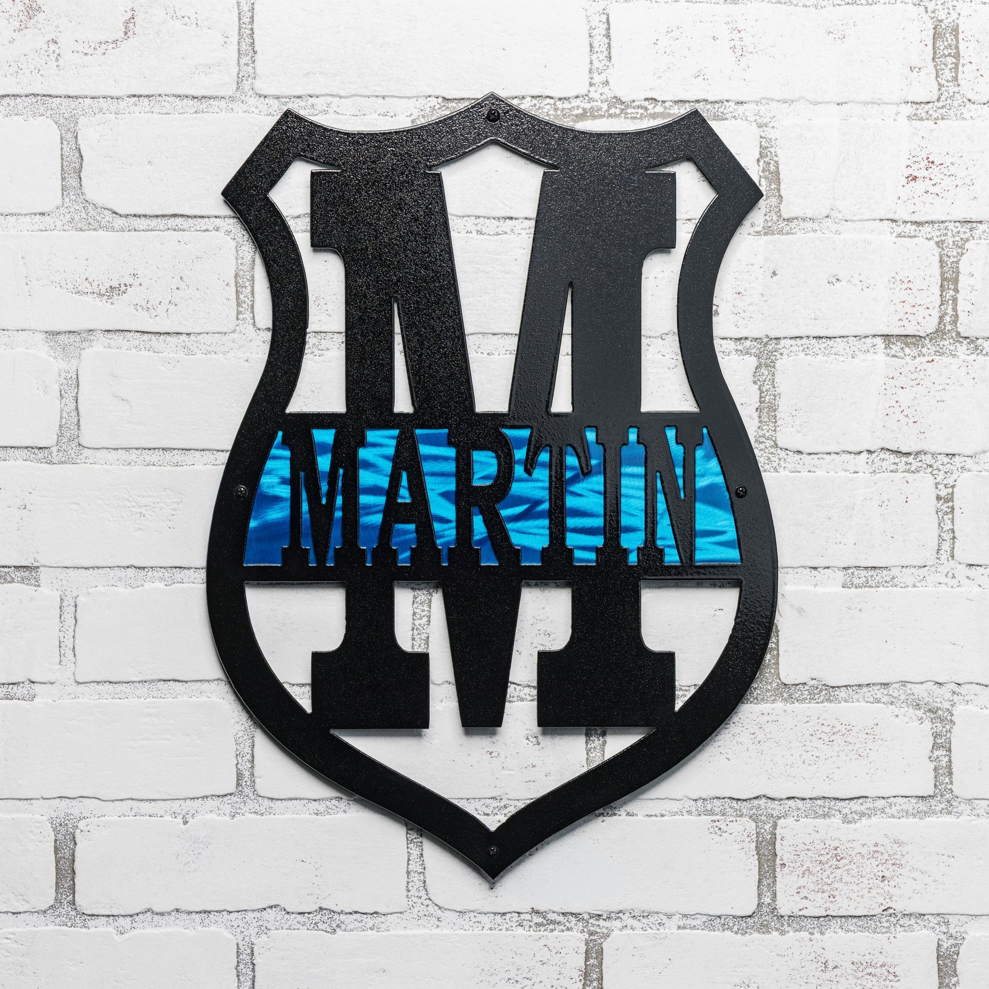 Personalized thin blue line monogram badge sign made from steel with custom police decor styling