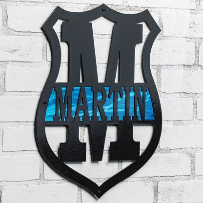 Custom law enforcement wall art featuring a metallic thin blue line background and personalized name design
